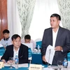 Phó Tổng Giám đốc VNMAC Nguyễn Văn Nghiệp báo cáo kết quả thực hiện dự án. (Ảnh: Dương Giang/TTXVN)