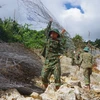 [Photo] Thủy điện Rào Trăng 3: Quyết tâm vượt khó tìm kiếm nạn nhân