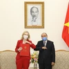 Thủ tướng Nguyễn Xuân Phúc tiếp Bộ trưởng Thương mại Quốc tế Vương quốc Anh Elizabeth Truss. (Ảnh: Văn Điệp/TTXVN)