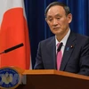 Thủ tướng Nhật Bản Suga Yoshihide tại cuộc họp báo về dịch COVID-19 tại Tokyo, Nhật Bản. (Ảnh: AFP/TTXVN)