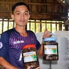 Sản phẩm ba khía muối được các hộ làm nghề tại huyện Ngọc Hiển, tỉnh Cà Mau. (Ảnh: Huỳnh Anh/TTXVN)