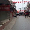 Đường phố trên địa bàn phường Sao Đỏ, thành phố Chí Linh vắng lặng trong sáng 29/1. (Ảnh: TTXVN phát)