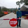 Chốt kiểm soát dịch tại xã Thủy An, huyện Đông Triều, tỉnh Quảng Ninh. (Ảnh: TTXVN phát)