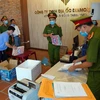 Cơ quan Cảnh sát điều tra Công an Bình Thuận khám xét trụ sở Công tyTNHH địa ốc Diamond Land. (Nguồn: tuoitre.vn/Công an cung cấp)