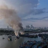 Hiện trường vụ cháy 3 tàu cá tại âu thuyền Thọ Quang, thành phố Đà Nẵng. (Ảnh: Trần Lê Lâm/TTXVN)