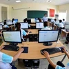 Sinh viên trong giờ học công nghệ thông tin. (Ảnh minh họa: Thanh Hà/TTXVN)