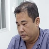 Đối tượng Trần Trí Mãnh bị bắt tại cơ quan điều tra. (Ảnh: TTXVN phát)