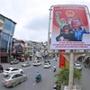 Pano tuyên truyền, cổ động bầu cử trên phố Nghi Tàm. (Ảnh: Hoàng Hiếu/TTXVN)