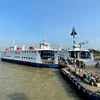 Phà An Hòa, thành phố Long Xuyên, sẽ bố trí 6 phà trọng tải từ 100 tấn đến 200 tấn phục vụ người dân, phương tiện vượt sông Hậu trong dịp Tết 2021. (Ảnh: Thanh Sang/TTXVN)