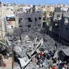 Hiện trường đổ nát sau vụ không kích của Israel xuống thành phố Khan Younis, Dải Gaza, ngày 19/5 vừa qua. (Ảnh: THX/TTXVN)
