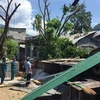 Giông lốc làm tốc mái nhà của người dân ở vùng cao Phước Bình, huyện Bác Ái. (Ảnh: Công Thử/TTXVN)