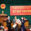 Thường trực HĐND tỉnh Đắk Nông tặng hoa, chia tay ông Nguyễn Đình Trung, Ủy viên Trung ương Đảng. (Ảnh: Nguyên Dung/TTXVN)