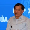 Chủ tịch UBND tỉnh Đặng Văn Minh phát biểu tại buổi đối thoại. (Ảnh: Sỹ Thắng/TTXVN)