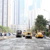 Công trường dự án sửa chữa, nâng cấp đường Nguyễn Hữu Cảnh. (Ảnh: Tiến Lực/TTXVN)