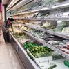 Nhóm hàng thực phẩm có sức mua tăng cao tại thị trường TP Hồ Chí Minh. (Ảnh: Mỹ Phương/TTXVN)