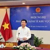 Bộ trưởng Bộ Công Thương Nguyễn Hồng Diên chủ trì hội nghị tại điểm cầu Hà Nội. (Ảnh: Trần Việt/TTXVN)