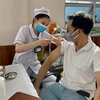 Nhân viên y tế tiêm vaccine phòng COVID-19. (Ảnh: Thanh Sang/TTXVN)