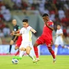Tiền đạo Tiến Linh có bàn mở tỷ số ở phút 39 của trận đấu giữa Việt Nam-Oman tại Vòng loại thứ 3 World Cup 2022 khu vực châu Á. (Ảnh: TTXVN phát)