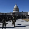 Lực lượng Vệ binh Quốc gia tuần tra tại tòa nhà Quốc hội ở Washington DC., ngày 3/3/2021. (Ảnh: AFP/TTXVN)