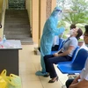 Thị xã Đông Triều tiến hành xét nghiệm tầm soát nhằm phát hiện sớm người mắc COVID-19. (Ảnh: Văn Đức/TTXVN)