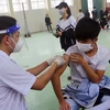 Triển khai tiêm vaccine cho học sinh ở vùng có dịch. (Ảnh: Đại Nghĩa/TTXVN)