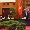 Thủ tướng Phạm Minh Chính phát biểu kết luận cuộc họp về việc nhập khẩu, sản xuất vaccine, thuốc điều trị COVID-19. (Ảnh: Dương Giang/TTXVN)