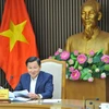 Phó Thủ tướng Lê Minh Khái phát biểu tại cuộc họp. (Ảnh: Minh Đức/TTXVN)