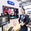 Một khách hàng dùng thử công nghệ nhận dạng khuôn mặt 3D tại tỉnh Chiết Giang. (Nguồn: chinadaily.com.cn)