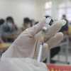 Quảng Ninh triển khai tiêm vaccine phòng COVID-19 mũi 3. (Ảnh: Thanh Vân/TTXVN)
