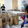 Đóng gói bột ca cao tại xưởng sản xuất của Công ty TNHH Thương mại-Dịch vụ-Sản xuất cacao Thành Đạt, xã Xà Bang, huyện Châu Đức, tỉnh Bà Rịa-Vũng Tàu. (Ảnh: Hoàng Nhị/TTXVN)