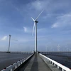 Nhà máy Điện gió Bạc Liêu được đánh giá góp phần quan trọng trong việc bảo vệ môi trường sống, giảm sự ảnh hưởng của biến đổi khí hậu. (Ảnh: Phan Tuấn Anh/TTXVN)