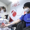 Tình nguyện viên đến tham gia hiến máu. (Ảnh: Minh Quyết/TTXVN)