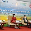 Đại diện chính quyền Thành phố Hồ Chí Minh, Liên đoàn Thương mại và Công nghiệp Việt Nam (VCCI), Tổ chức Quốc tế Pháp ngữ (OIF) chủ trì phiên khai mạc Diễn đàn doanh nghiệp Pháp ngữ. (Ảnh: Mỹ Phương/TTXVN)