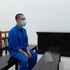 Bị cáo Huy tại phiên tòa. (Nguồn: cand.com.vn)