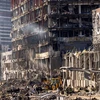 Những tòa nhà bị phá hủy trong xung đột tại tại phía bắc thủ đô Kiev, Ukraine ngày 21/3 vừa qua. (Ảnh: AFP/TTXVN)