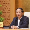 Phó Thủ tướng Lê Văn Thành chủ trì cuộc họp. (Ảnh: Lâm Khánh/TTXVN)