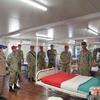 Các y, bác sỹ Việt Nam thăm Bệnh viện dã chiến cấp 2 Ấn Độ. (Nguồn: qdnd.vn)