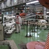 Hoạt động sản xuất tại Nhà máy Bắc Dương, chi nhánh Công ty Cổ phần Dây và Cáp điện Thượng Đình. (Ảnh: Mạnh Minh/TTXVN)