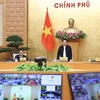 Thủ tướng Phạm Minh Chính chủ trì hội nghị triển khai Chương trình phục hồi và phát triển kinh tế-xã hội. (Ảnh: Dương Giang/TTXVN)