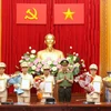 Bộ trưởng Tô Lâm trao các Quyết định của Bộ Chính trị cho các đồng chí được chỉ định tham gia Đảng ủy, Ban Thường vụ Đảng ủy Công an Trung ương nhiệm kỳ 2020-2025. (Nguồn: cand.com.vn)