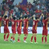 Các cầu thủ U23 Việt cảm ơn người hâm mộ trong ngày chia tay Việt Trì để trở về Hà Nội đá trận chung kết. (Ảnh: Hải An/Vietnam+)
