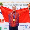 VĐV Nguyễn Thị Hương của Việt Nam giành huy chương Vàng ở nội dung thuyền đơn nữ Canoeing-WC1 500. (Ảnh: Minh Đức/TTXVN)