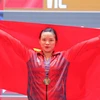 Phạm Thị Hồng Thanh phá 3 kỷ lục SEA Game, giành huy chương Vàng hạng cân 64kg. (Ảnh: VIệt Cường/TTXVN)