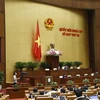 Quốc hội biểu quyết thông qua Nghị quyết về chủ trương đầu tư Dự án đầu tư xây dựng đường Vành đai 4 - vùng thủ đô Hà Nội. (Ảnh: Doãn Tấn/TTXVN)