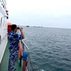 Tàu của Bộ đội Biên phòng Bình Thuận tìm kiếm tại khu vực tàu cá BTh 97478 TS bị mất liên lạc. (Ảnh: TTXVN phát)
