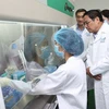 Hình ảnh Thủ tướng thăm làm việc với các đơn vị giám định ADN 