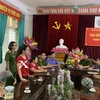 Đối tượng Trần Việt Anh, đánh dấu X, mặc áo đỏ. (Nguồn: cand.com.vn)