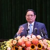 Thủ tướng Phạm Minh Chính phát biểu tại Hội nghị triển khai Nghị quyết số 11-NQ/TW. (Ảnh: Dương Giang/TTXVN)