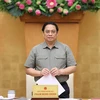Thủ tướng Phạm Minh Chính chủ trì Phiên họp Chính phủ chuyên đề pháp luật. (Ảnh: Dương Giang/TTXVN)