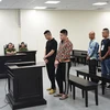 Các bị cáo tại phiên tòa. (Nguồn: hanoimoi.com.vn)